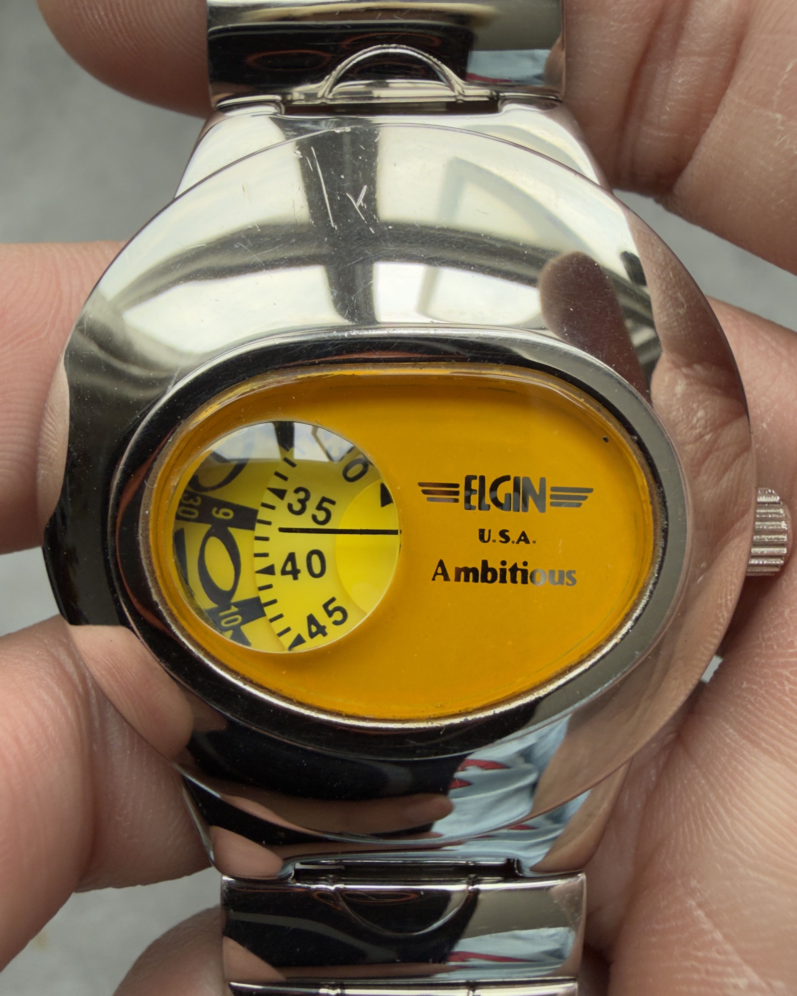 ELGIN AMBITIOUS ROTATING DISC VINTAGE QUARTZ WATCH