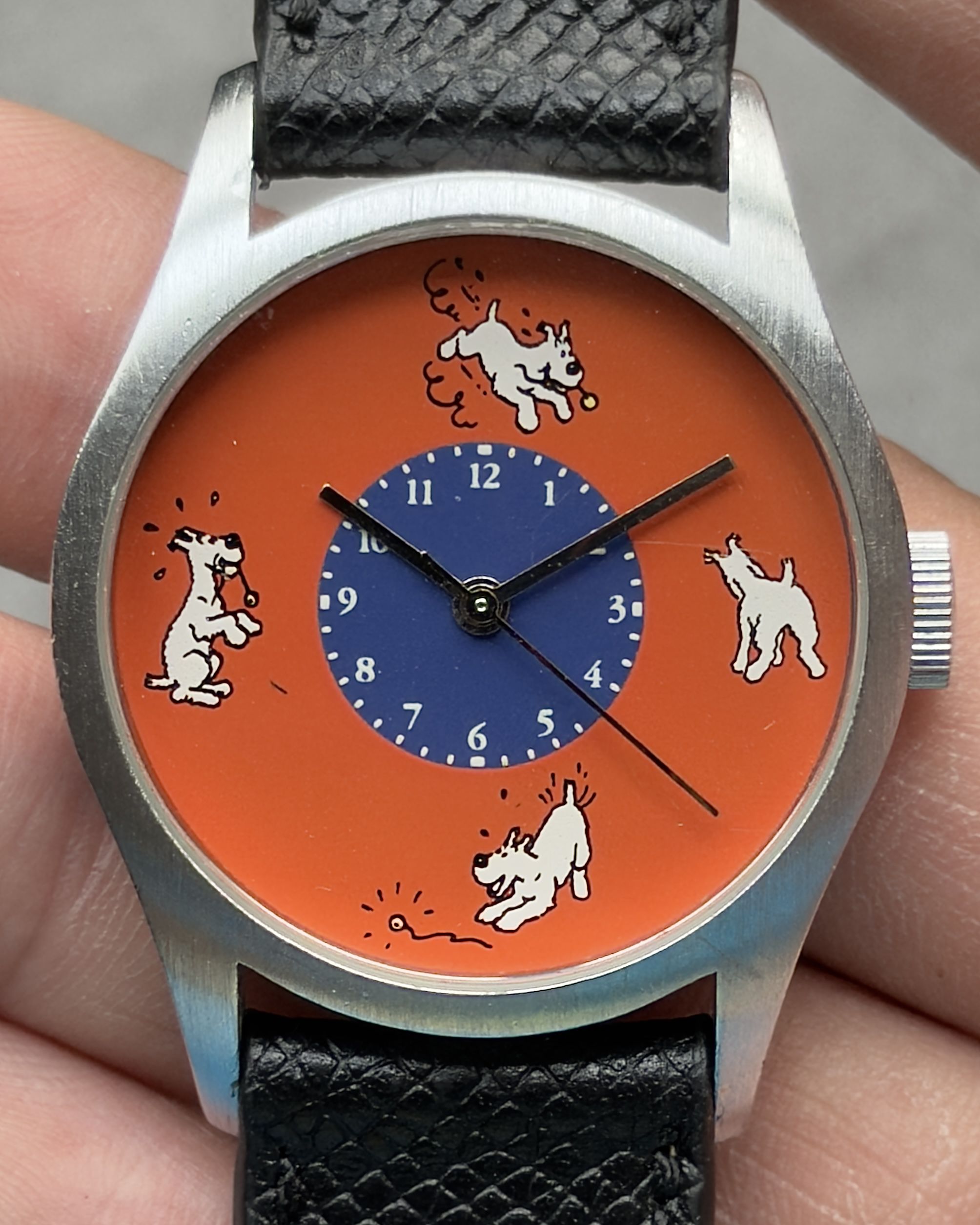 TINTIN SNOWY ORANGE DIAL VINTAGE QUARTZ WATCH