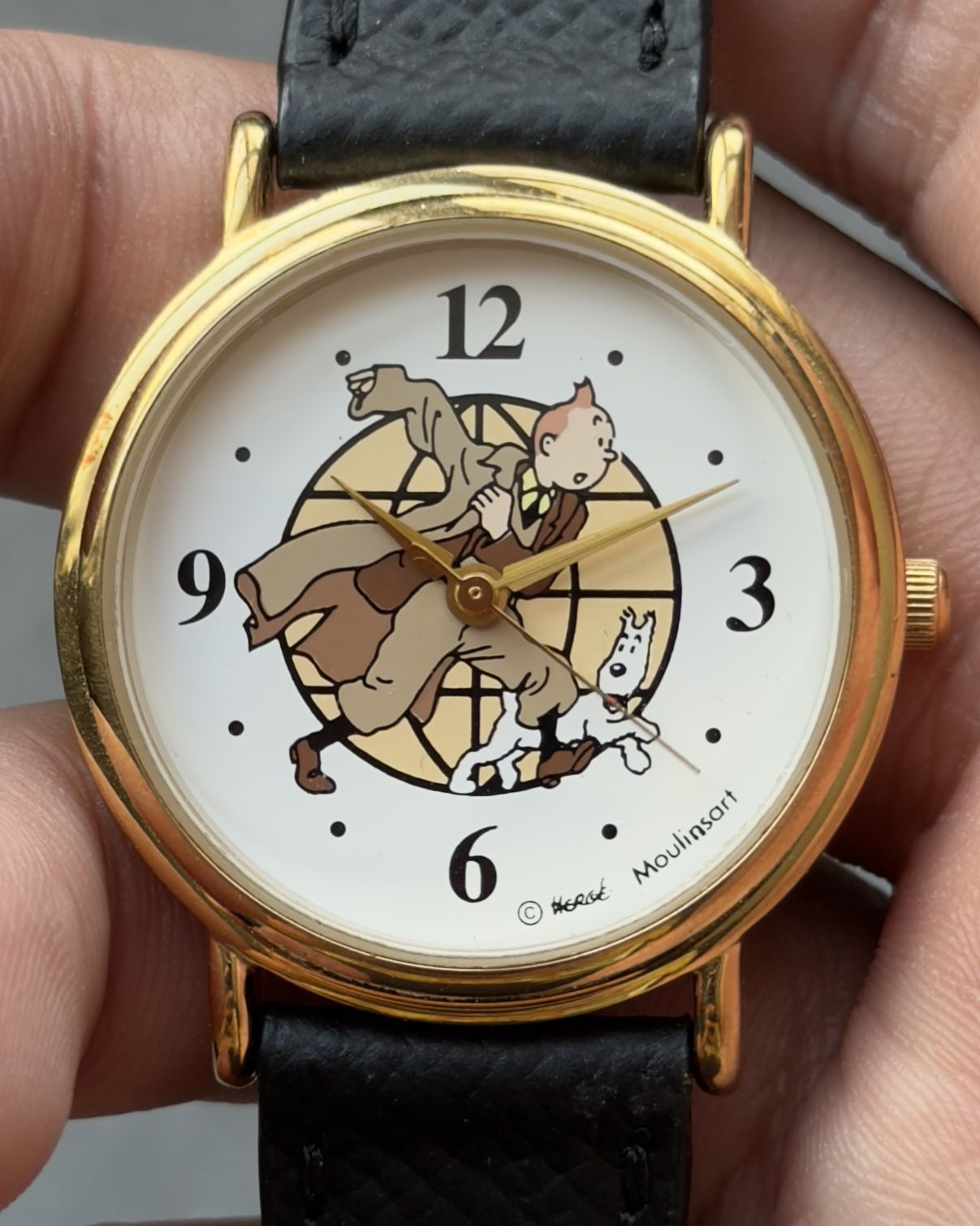 TINTIN GLOBE DIAL VINTAGE QUARTZ WATCH